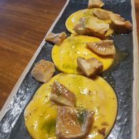 Vegan fresh pasta filled with pumpkin and orange zest  and wild mushroom in sherry wine ? amazing!! at Séptimo Arte in Conil De La Frontera