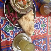 Fuul eskerandi and lemon mint drink  at Koshari Korner in Marrickville