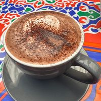 Hot chocolate includes dairy even if ordered with plant milk at Koshari Korner in Marrickville