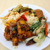 Sweet potatoes and bell pepper, brown rice, mock fish in sweet and sour sauce with raw minced vegetables, sautéed pak choi, mushrooms and carrots with tofu, sautéed veggies. at Tze Ern Vege Restaurant 慈恩素食 in Kuala Lumpur