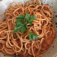 Amazing hot coconut curry sauce with spaghetti.  at Delish in Hout Bay