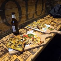 Potato and truffle, tomato and basil, mushroom and vegan cheesee  at Latin Pizza in Bucharest