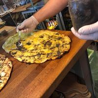 The best pizza in the world ... Pizza with potatoes, vegetable mozzarella and truffles...yam...yam...yam... at Latin Pizza in Bucharest