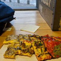 Super vegan pizza options. I love the one with cherry tomatoes and pesto. at Latin Pizza in Bucharest