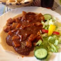“Dinich Wot”: medium hot potato goulash with Injera  at Africa in Tubingen