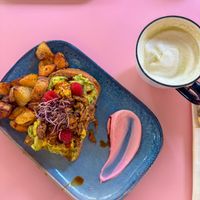 Avocado on toast with scrambled tofu and matcha latte with soy milk   at Ziga in Verona
