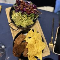 Guacamole with nachos and croutons  (vegan)  at Ziga in Verona