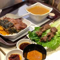 Lamb skewers, satay sauce, and Unagi fillet, char siu, pumpkin on rice  at Loving Hut - Amoy Plaza in Kowloon