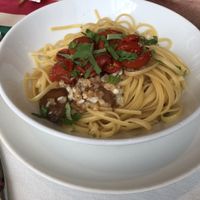 Delicious freshly made egg free pasta with sun blush tomatoes, garlic.  at Livio in Neuilly-sur-seine