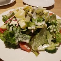 salad with "cheese" dressing at Nataraj - Harajuku Omotesando in Tokyo