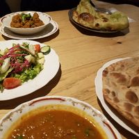 all vegan: komatsuna (Japanese mustard spinach) naan, another wheat bread, salad with "cheese" dressing, baingan bharta, soymeat curry  at Nataraj - Harajuku Omotesando in Tokyo