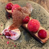 Tsokolate (dark chocolate mousse on a chocolate cookie with raspberry). at Pobrecito in Helsinki