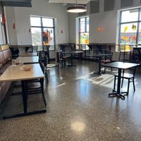 A seating area near the salad bar  at The People's Food Co-op in Rochester