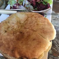 Puccia filled with cannellini bean and olive spread and chickory sprouts  at Sullaluna in Venice