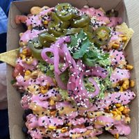 Nachos (single serve), with added jalapeños and guacamole   at Goodness Gracias in Palm Beach