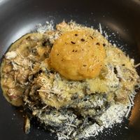 Charcoal spagetti with vegan egg yolk at Mark & Vinny's Spaghetti & Spritz in Surry Hills