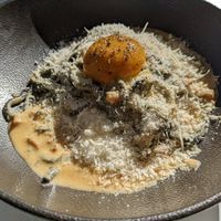 Charcoal bucatini with vegan egg at Mark & Vinny's Spaghetti & Spritz in Surry Hills