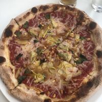 Vegan pizza with artichokes and pine nuts  at Flour & Barley in Las Vegas