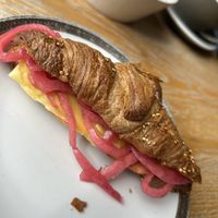 Croissant hamm & cheeze with pickled onion 6,90€
  at Blackbird in Bruges