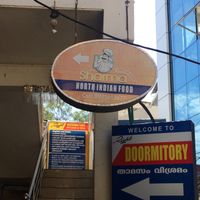 sign in alleyway at Sharma in Thiruvananthapuram