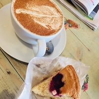 Almond and raspberry cake with chai tea at The Gratitude Cafe in Telford