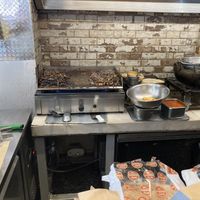  Cooking the souvlaki at Cookoomela Grill in Athens