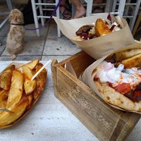Souvlaki & extra potatoes. at Cookoomela Grill in Athens