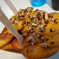 Bacon and cheese skin potato fries at Cookoomela Grill in Athens