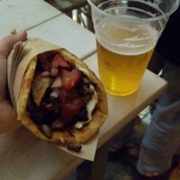 Red amanita with their beer at Cookoomela Grill in Athens