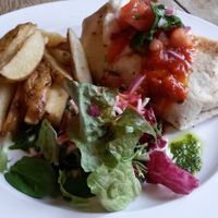 Refried bean & coconut chilli wrap served with sour cream, jalapeños & salad at The 78 in Glasgow