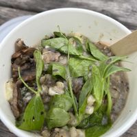 Delicious mushroom barley porridge with Danish cheese   at GRØD -Torvehallerne in Copenhagen