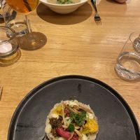 Vorspeisen (beide vegan): Pastinakencremesuppe und ein Blumenkohltartar  at Brunner in Schladming