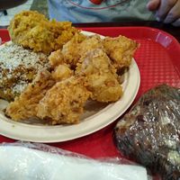 Stuffed bell pepper, fried cauliflower, cornbread dressing and brownie at Sweet Soulfood in New Orleans