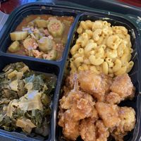 Greens, okra gumbo, Mac and cheese, orange cauliflower   at Sweet Soulfood in New Orleans
