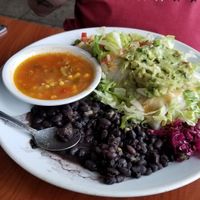 The hubs burrito is buried somewhere in there but it was great!! at Tequila Blue Agave in Lincoln City