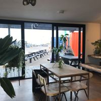 View of entrance from inside restaurant  at Dr Legumes in Folkestone