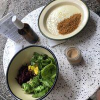 Salada vegana e o “risotto” vegetariano  at Futuro Refeitório in Sao Paulo