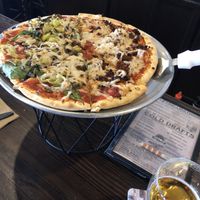 Daiya and half soy chorizo + Zeus beer at Bakersfield Pizza Co in Bakersfield