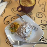 Vegan cinnamon roll and golden milk latte (oat milk)  at Simon's Coffee House in Sarasota