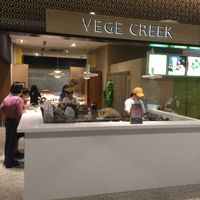 Step 4: Food is being prepared at the counter at Vege Creek 蔬河 - 101 in Taipei