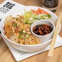 Vegan Vermicelli

Vermicelli noodles with bean sprouts, basil, cucumbers, lettuce, daikon, carrots, vegan spring roll, tofu topped with crushed peanuts, fried onions, green onions  at Dundas in Vancouver