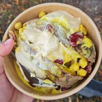 Baked potato with hummus and bean curry. Tasty! at Atmajala in Norrtalje