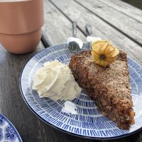 Walnut & parsnip cake with some whipped cream   at Hermans in Stockholm
