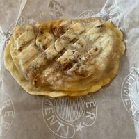 Mezzaluna filled with potatoes, macinato, and Milkaway sauce  at Milkaway in Naples