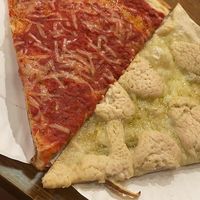 Vegan regular slice and vegan white with cashew ricotta  at NY Pizza Suprema in New York City