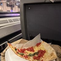 Slice before the train to the airport 🍕  at NY Pizza Suprema in New York City