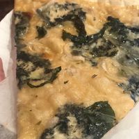 Spinach. Artichoke. Truffle Brie pizza at NY Pizza Suprema in New York City