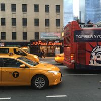 View form across the street, gives a sense of the neighborhood. at NY Pizza Suprema in New York City