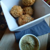 Vegan bitterballen: a stew-based snack served with mustard at Brouwerij Het Anker in Mechelen