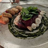 Smoked watermelon on almond cream and pesto. Wow at Casa Lėlytė in Bogota